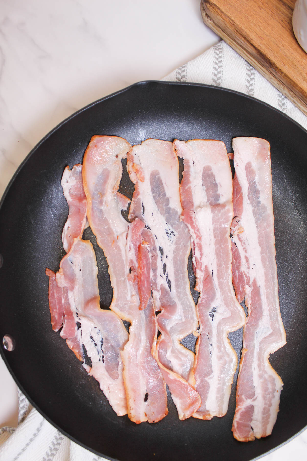 Bacon in a frying pan
