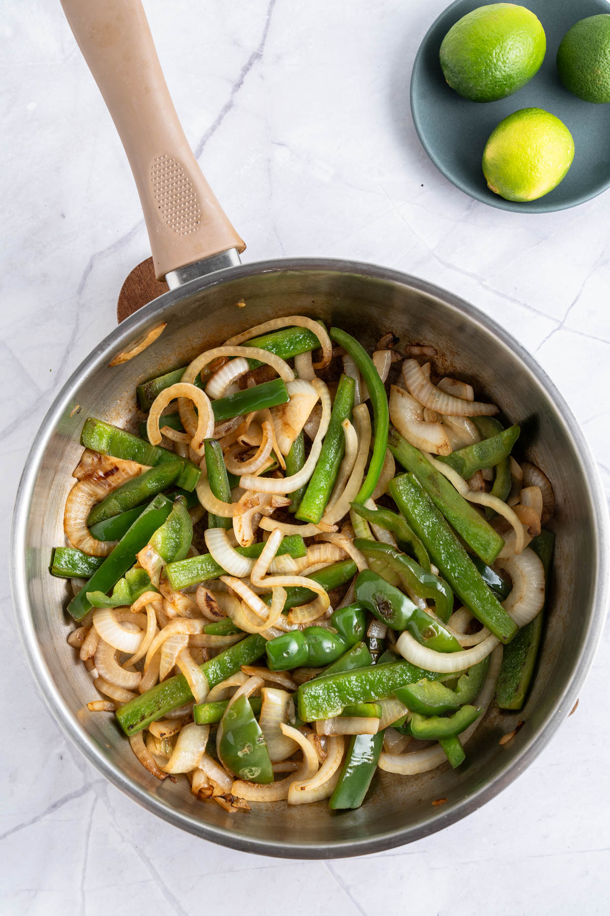 Green beans and onions in a pan