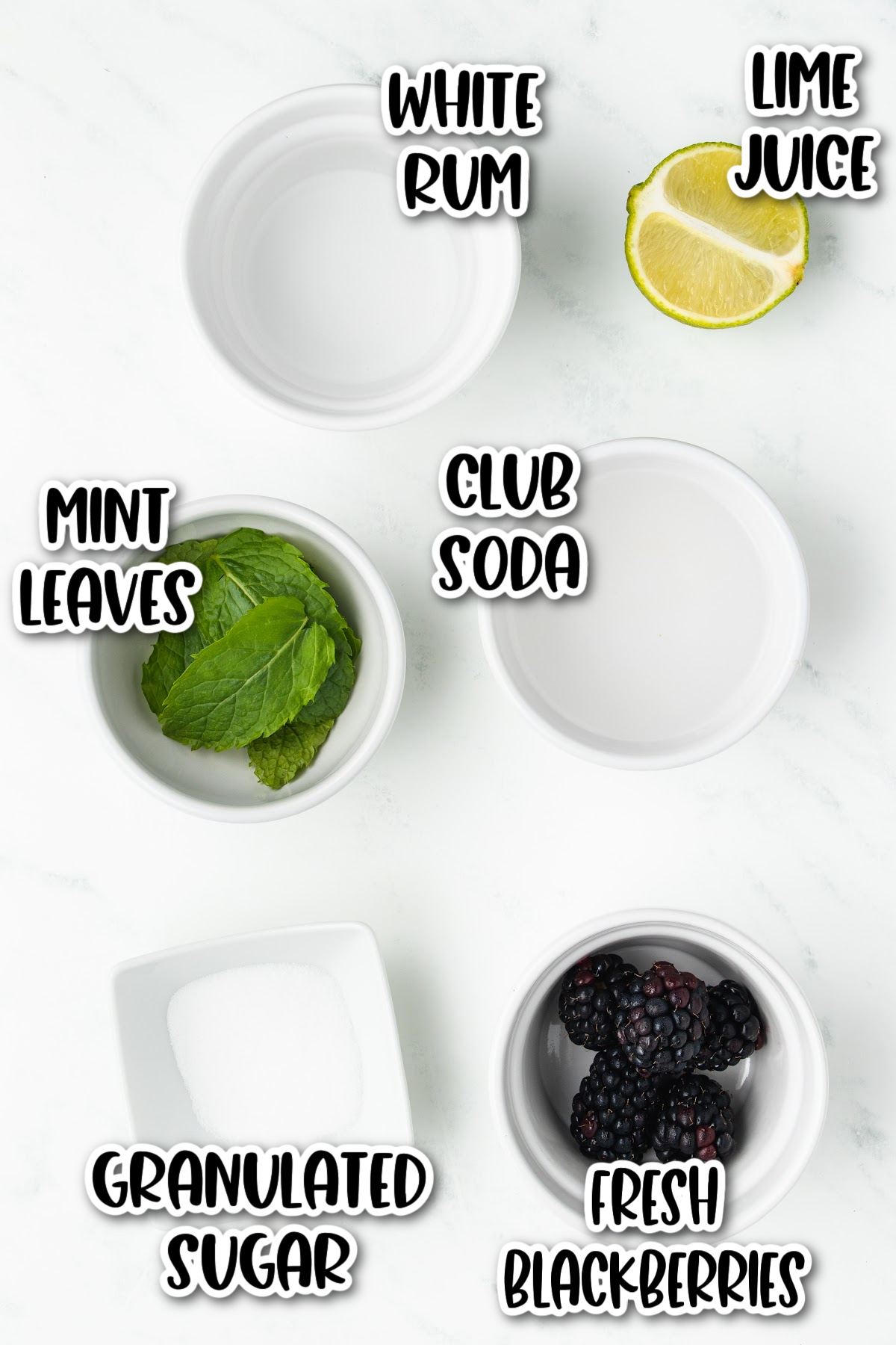The ingredients for a blackberry mojito
