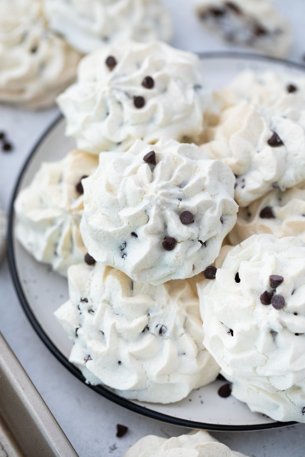 Chocolate chip meringue cookies on a plate