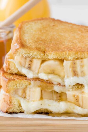 A grilled cheese sandwich with bananas and honey.
