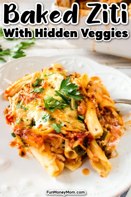 A plate of baked ziti with melted cheese and parsley garnish, highlighting the inclusion of hidden veggies in the recipe.