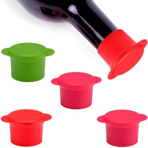 Colorful silicone wine stoppers and a bottle.