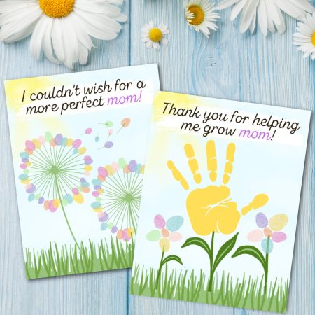 Two mother's day cards on a wooden surface, surrounded by daisies, featuring floral designs and messages for mom.