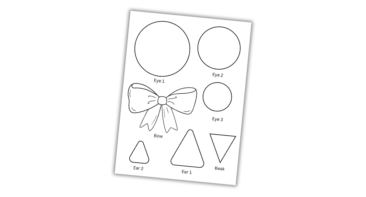 A worksheet with outlined shapes labeled as Eye 1, Eye 2, Eye 3, Bow, Ear 1, Ear 2, and Beak.