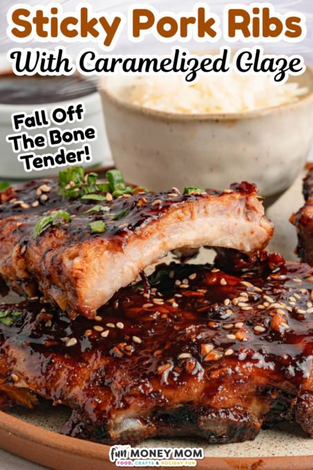 A plate of sticky pork ribs with caramelized glaze, garnished with sesame seeds and green onions, with a bite taken from one rib. Text overlay describes the dish.