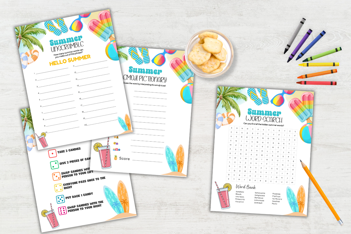 Four colorful summer-themed activity sheets with surfboards, ice cream, and beach items are displayed on a white surface with crayons, colored pencils, and a plate of cookies nearby.